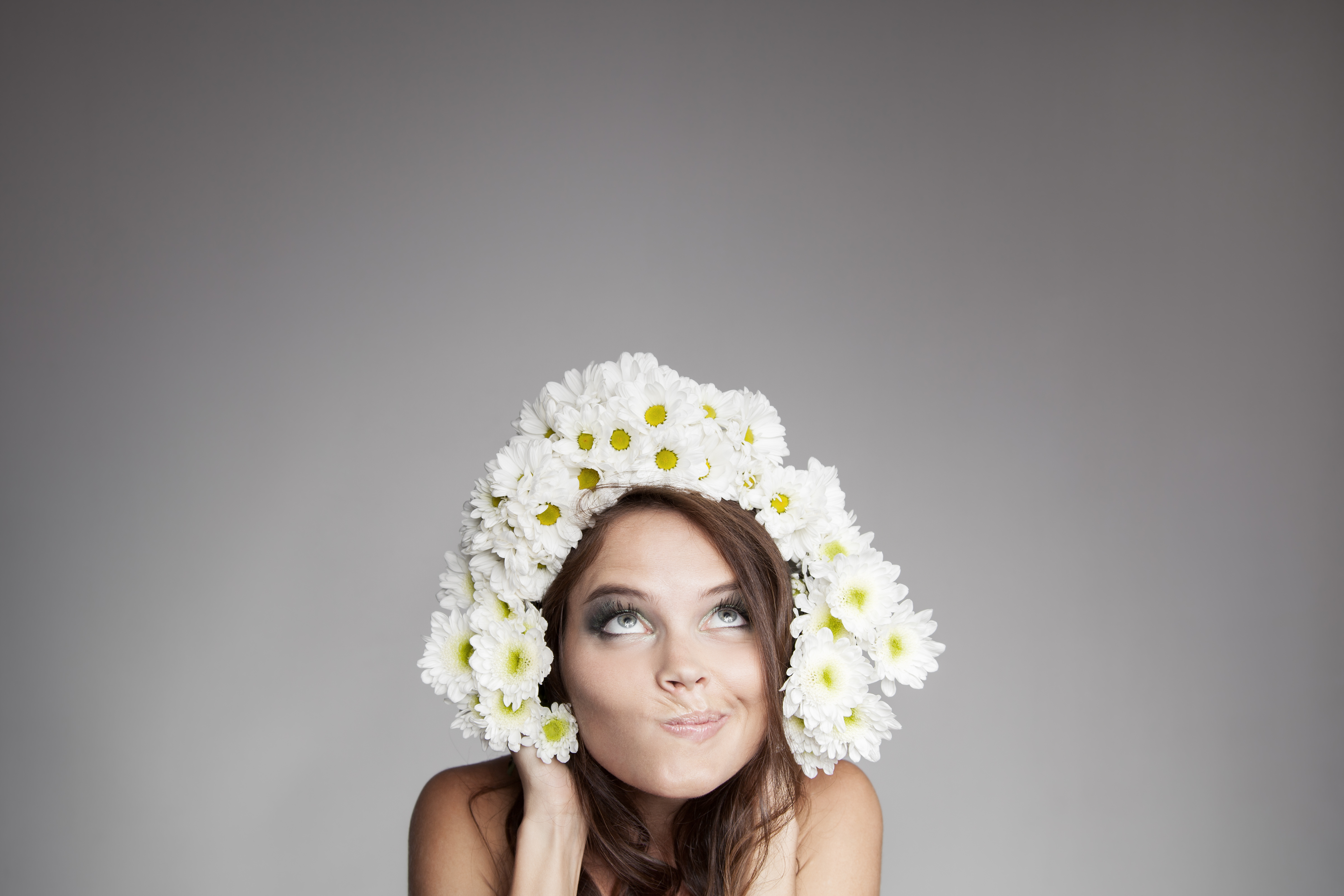 Surprised Thinking Woman With Flower Wreath Looking Up At Copy S